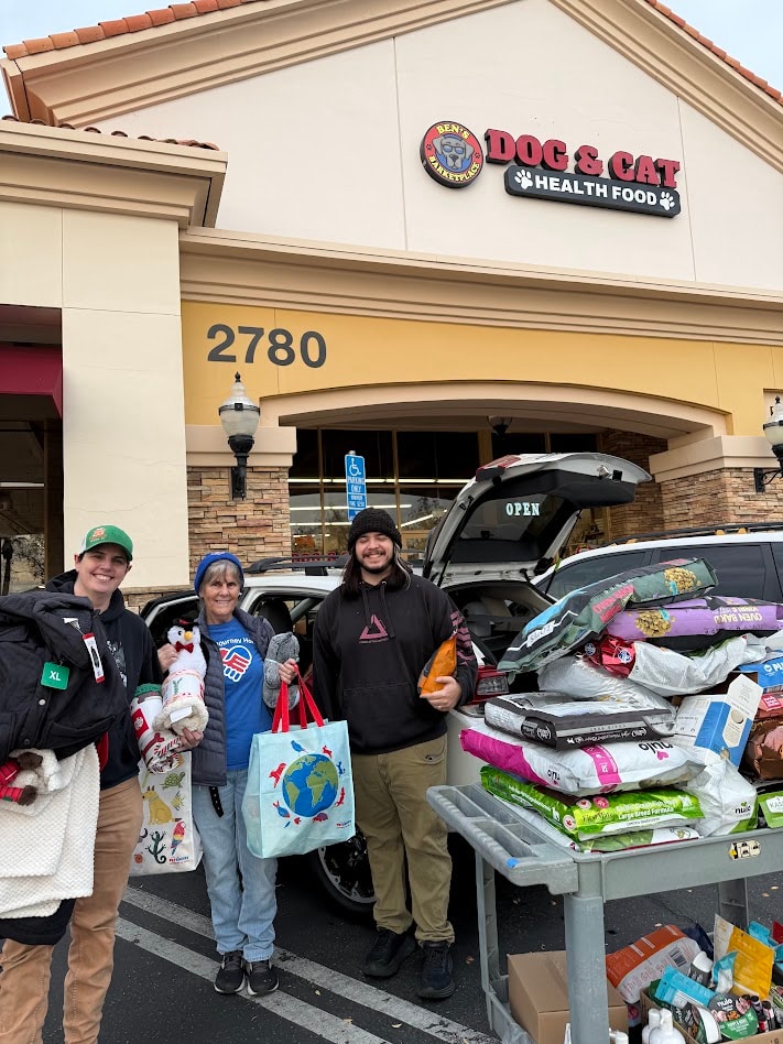 Pet food and supplies collected outside Dog and Cat Health Food