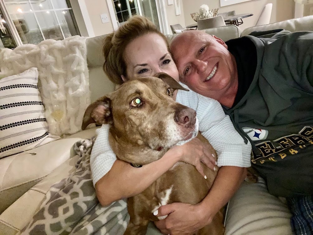 A first responder sharing a bond with their dog